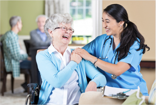 nurse and patient laughing